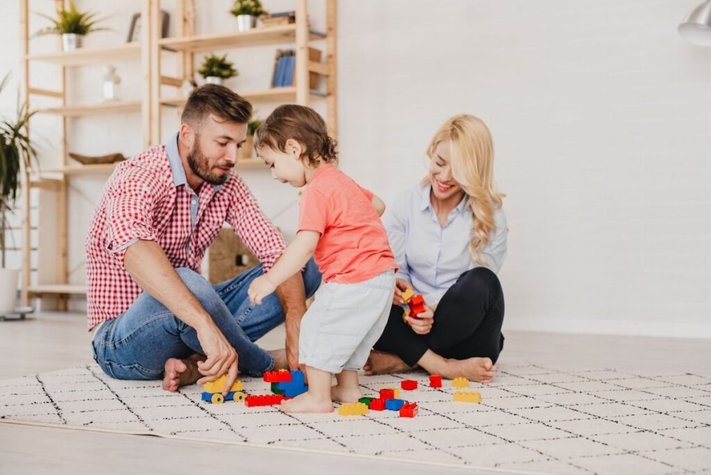 Couple playing with a child.