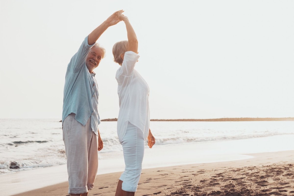 Couple dancing on the beach