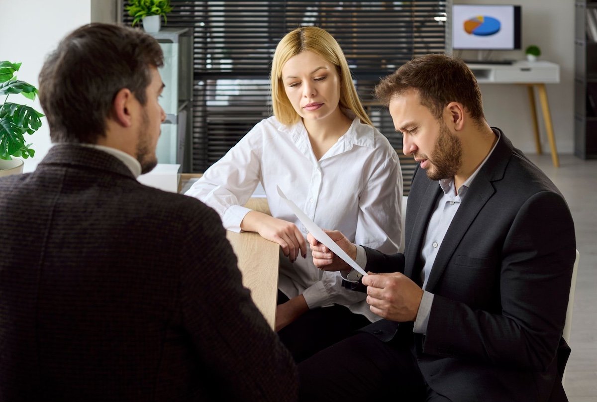 Couple reviewing paperwork